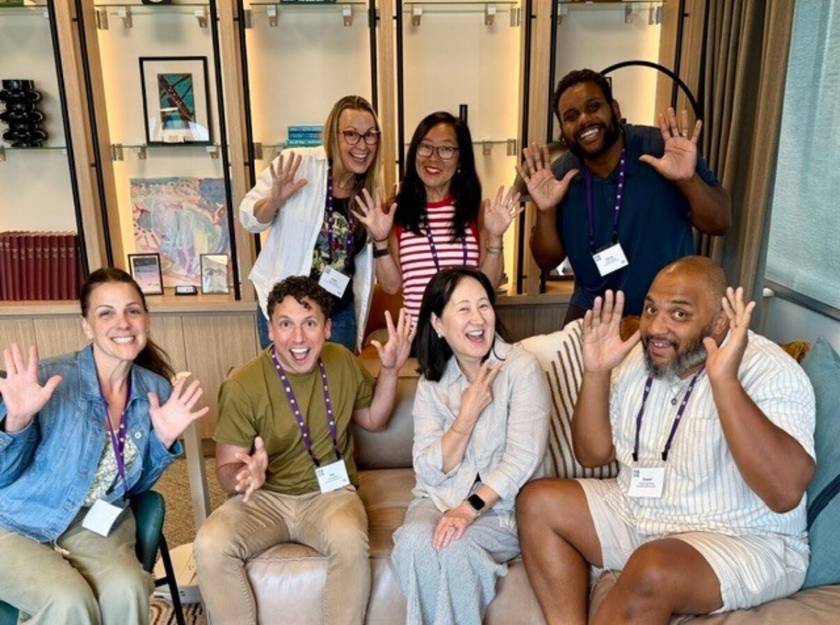 NAIS Aspiring Heads Fellowship cohort waving together at the Summer Institute